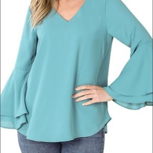 Brand new teal blouse
